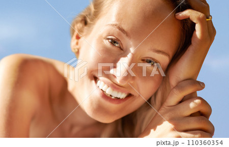 Woman, portrait and relaxing in outdoors and sunbathing, vacation and travel to Hawaii. Female person, resting and happy by sky background and peace, nature and wellness on holiday and smiling 110360354