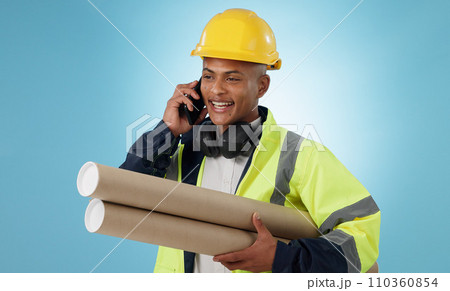 Engineering, man and phone call of construction design planning or project management communication in studio. Builder or worker with mobile chat, blueprint and architecture advice on blue background 110360854