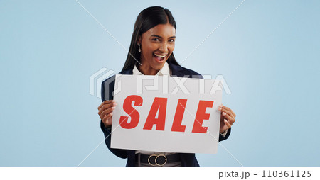 Happy woman, portrait and sale sign for discount, advertising or deal against a blue studio background. Excited female person with billboard or poster for marketing, promo or special on mockup space Happy woman, portrait and sale sign for discount, advertising or deal against a blue studio background. Excited female person with billboard or poster for marketing, promo or special on mockup space 110361125