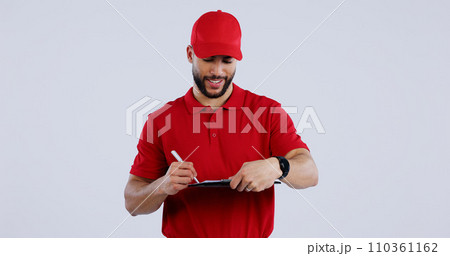 Happy man, delivery and writing on clipboard for signature, order or form against a studio background. Male person or guy in courier service smile for filling paperwork, legal document or agreement 110361162