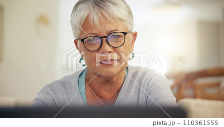 Laptop, home and senior woman online for internet banking, life insurance and mortgage payment. Reading screen, retirement and elderly person on computer for networking, communication and website 110361555