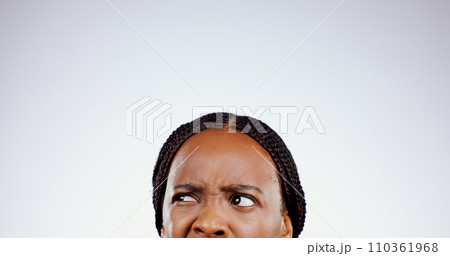 Confused, face and eyes of black woman thinking with doubt, questions or remember idea in white background. Mockup, space and person frustrated with a memory, choice or planning a decision in studio Confused, face and eyes of black woman thinking with doubt, questions or remember idea in white background. Mockup, space and person frustrated with a memory, choice or planning a decision in studio 110361968