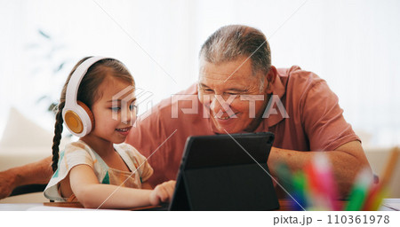 Tablet, senior man and child, education and elearning at home, remote and home schooling on technology. Grandfather, girl and app or website, search and streaming or fun, play and internet or happy 110361978