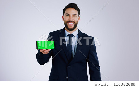 Business man, phone green screen and presentation for stock market, trading software or registration in studio. Portrait of professional trader with mobile app or website mockup on a white background 110362689