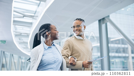 Happy business people, walking and travel at airport for work trip, team or flight together. Businessman, woman or colleagues smile for traveling, friendship or mission in hallway or boarding gates 110362811