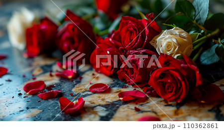 A bouquet of beautiful red roses on a marble table, a card idea for Valentine's Day and International Women's Day A bouquet of beautiful red roses on a marble table, a card idea for Valentine's Day and International Women's Day 110362861