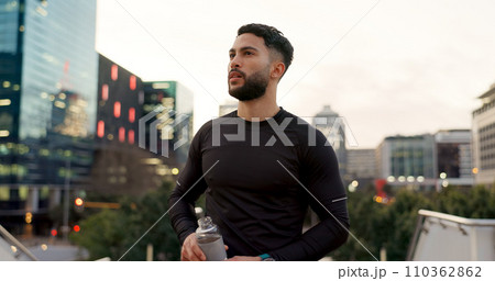 Fitness, face and thinking, man in city on rest from morning workout with water bottle. Relax, breathing and tired athlete with calm urban exercise with fatigue, reflection and drink on street Fitness, face and thinking, man in city on rest from morning workout with water bottle. Relax, breathing and tired athlete with calm urban exercise with fatigue, reflection and drink on street 110362862