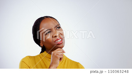 Thinking, confused and black woman in a studio with memory, brainstorming and planning facial expression. Guess, question and young African female model with solution face isolated by gray background 110363248