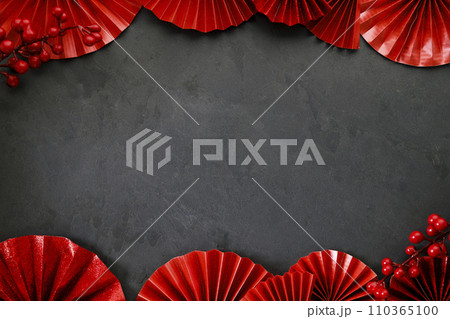 Chinese new year festival decorations with red Chinese folded fans. 110365100