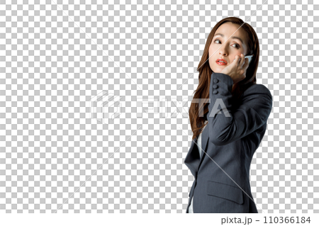 A woman talking on a smartphone. Transparent background photo PNG precisely cut out with a clipping path 110366184