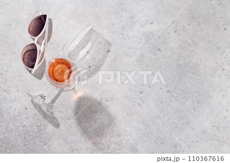 Refreshing rose wine by the pool on a sunny day 110367616