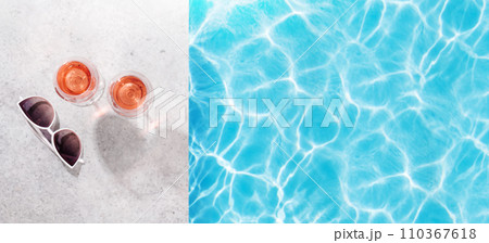 Refreshing rose wine by the pool on a sunny day Refreshing rose wine by the pool on a sunny day 110367618