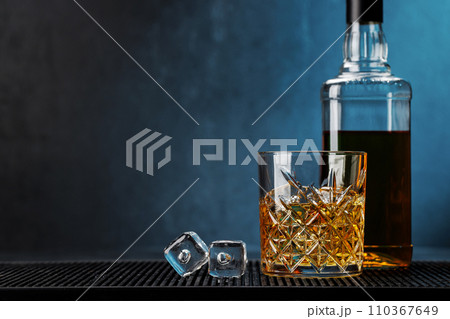 Whiskey with crystal clear ice cubes Whiskey with crystal clear ice cubes 110367649