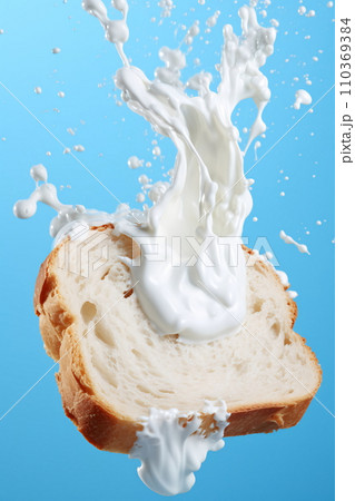 Milk splash on sliced bread against blue background AI Generated 110369384