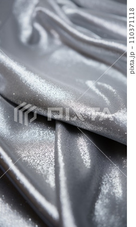 Glitter bokeh of satin fabric for background. Textile close up rippled elegant 110371118