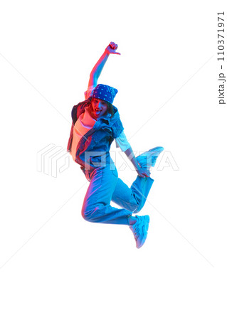 Hip hop, contemp, dance hall, street style dancer. Young girl in motion dancing isolated over white background in neon light Hip hop, contemp, dance hall, street style dancer. Young girl in motion dancing isolated over white background in neon light 110371971