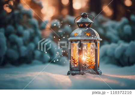 Decorated Christmas lantern with burning candle outdoors 110372210