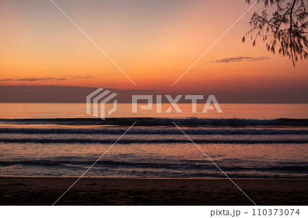 Morning seaside with twilight light. Ocean waves. Morning seaside with twilight light. Ocean waves. 110373074