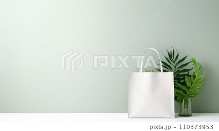 Layout for the design of a simple white canvas shopping bag with green plant leaves Layout for the design of a simple white canvas shopping bag with green plant leaves 110373953