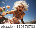 Portrait of beautiful smiling mature woman with long gray hair 110376732