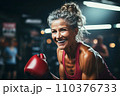 Portrait of athletic gray hair woman working out in gym . Fitness and bodybuilding concept 110376733