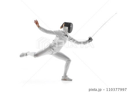 Fencer's footwork and poised stance in mid-bout against a pristine white studio background. Tactical aspect dynamic sport. 110377997