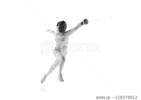 Professional female fencer lunging with grace and precision, flash of her sword against white studio background. Dance of competition. 110378012