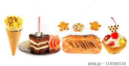 Sweet pastries and other desserts isolated on white . Wide photo. Collage. Sweet pastries and other desserts isolated on white . Wide photo. Collage. 110380110