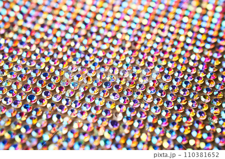 Abstract background made of rhinestones shimmering in the light. Abstract background made of rhinestones shimmering in the light. 110381652
