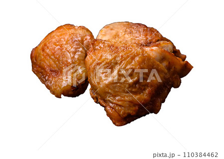 Delicious grilled chicken thighs with salt, spices and herbs 110384462