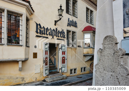 Entrance to the old pharmacy museum of Tallinn on the Town Hall Square in the Historical Center of city. Tallinn, Estonia 110385009