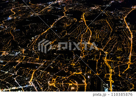 Nightscape of the city with lights from the aerial view. 110385876
