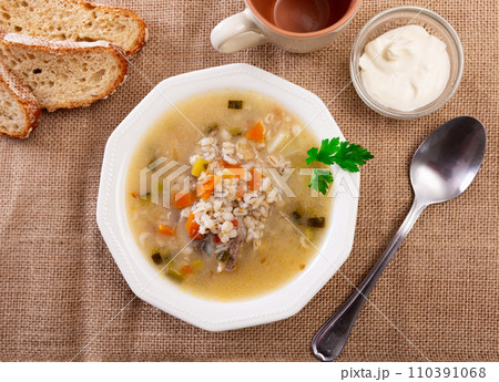 Rassolnik - Traditional Russian soup with pickled cucmbers Rassolnik - Traditional Russian soup with pickled cucmbers 110391068