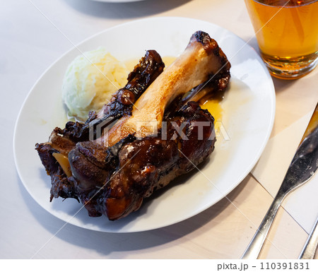 Baked pork knuckle with mashed potatoes Baked pork knuckle with mashed potatoes 110391831