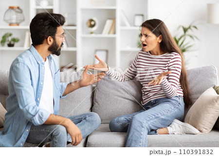 Angry emotional indian couple fighting at home Angry emotional indian couple fighting at home 110391832