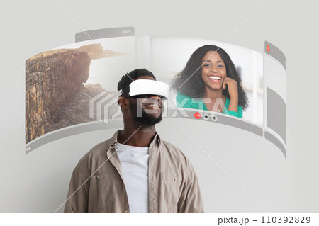 Black Guy Communicating With Girlfriend Making VR Video Call Indoor 110392829