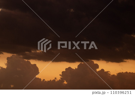 Orange, Black and white dramatic sunset sky line  110396251