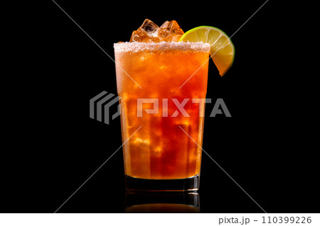 Michelada cocktail in beer glass featuring with beer, lime juice, tomato juice, spicy sauce and spices on black. 110399226