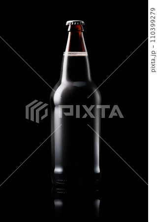 Beer bottle on a dark black background. Bottle with drink like Ipa, Pale Ale, Pilsner, Porter or Stout 110399279