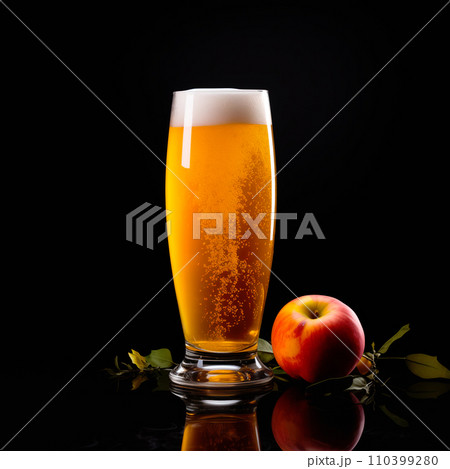 Beer or cider in a tall glass on a dark black background. Mugs with drink like Ipa, Pale Ale, Pilsner, Porter or Stout Beer or cider in a tall glass on a dark black background. Mugs with drink like Ipa, Pale Ale, Pilsner, Porter or Stout 110399280