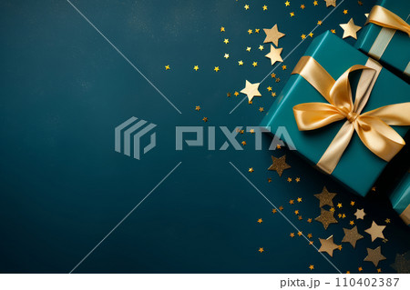 AI-generated content. Elegant gift box with gold satin ribbon and confetti on dark background. Top view of birthday or Christmas gift with copy space for party. 110402387