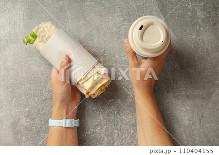 Tasty fast or homemade food concept - delicious shawarma Tasty fast or homemade food concept - delicious shawarma 110404155