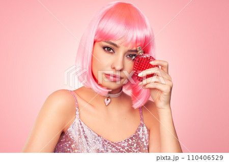 Beautiful glamorous girl with a perfume bottle 110406529
