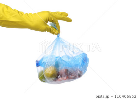 PNG, Blue bag with rubbish in gloved hand, isolated on white background 110406852