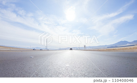 Embarking on a road trip from Nevada to California, driving on Highway 15 during the day offers scenic views and an exciting journey between states. 110408046
