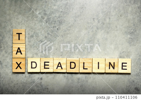 Wooden cubes with TAX DEADLINE letters Wooden cubes with TAX DEADLINE letters 110411106