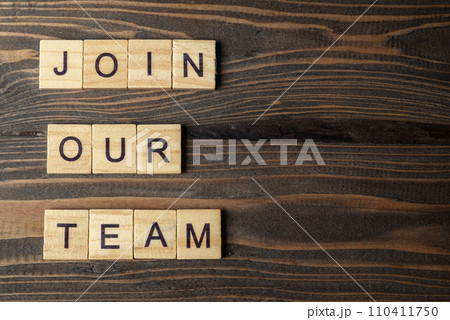 Wooden cubes with Join Our Team letters on a wooden table Wooden cubes with Join Our Team letters on a wooden table 110411750