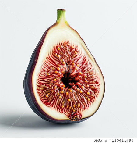 Half of a purple fig isolated on white background Half of a purple fig isolated on white background 110411799