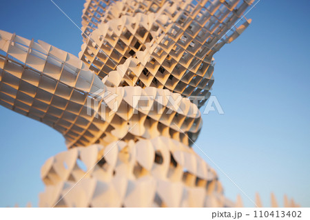 The fragment of monument in futuristic style. The photo taken with a tilt-shift lens. Anaklia, Georgia. Abstract background for modern design.  110413402