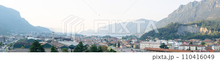 Panoramic view of cityscape Lecco, beautiful view to the city in the mountain valley Panoramic view of cityscape Lecco, beautiful view to the city in the mountain valley 110416049